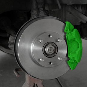 A car's braking system featuring highlighted calipers and brake pads.