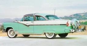 A teal-colored 1956 Ford Fairlane Crown Victoria.