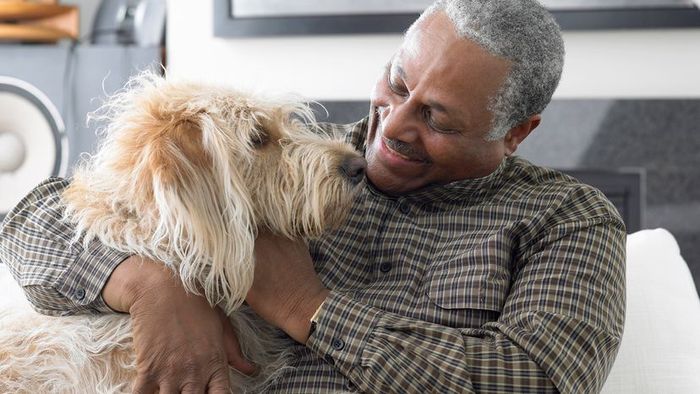 A man bonding with his canine companion