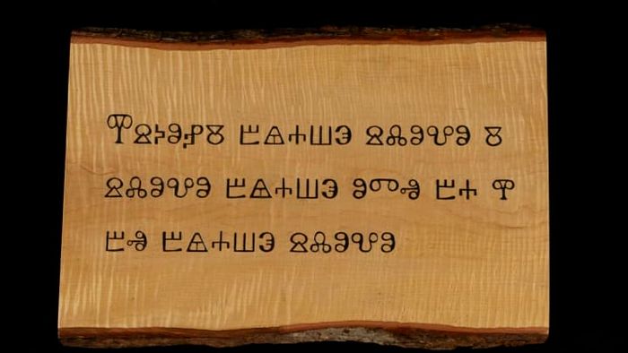 Wooden carvings featuring the Glagolitic script