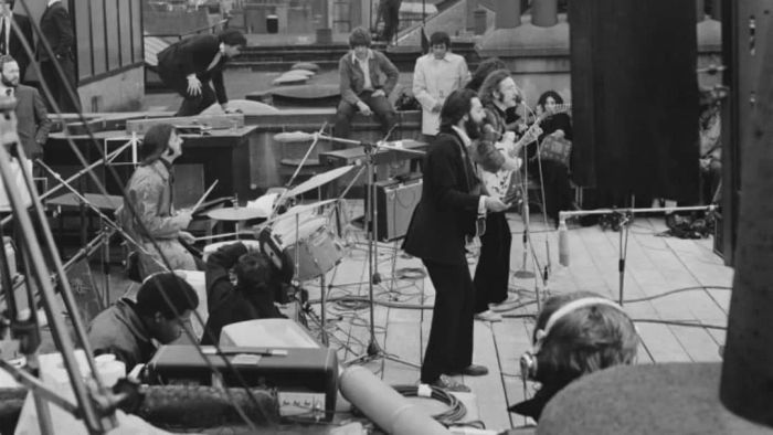The Beatles performing their final live concert in public on the rooftop of London's Apple building on January 30, 1969.