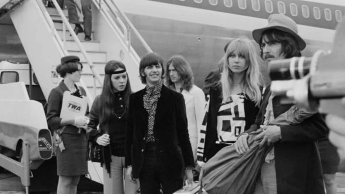 Ringo Starr, Maureen Cox, George Harrison, Pattie Boyd, and Eric Clapton at Heathrow Airport in 1968.