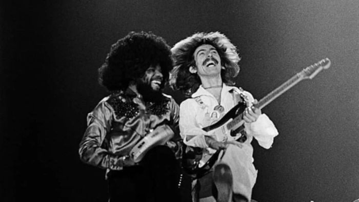 George Harrison and Billy Preston perform on stage at Maryland's Capitol Center in 1974.