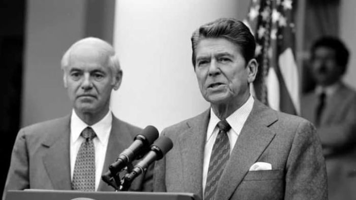 President Reagan and Attorney General William French Smith delivering a statement in the Rose Garden in 1981.