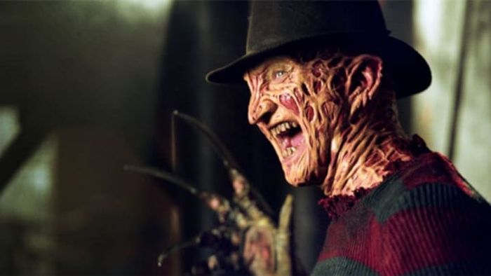 Robert Englund portrays the iconic Freddy Krueger in A Nightmare on Elm Street.