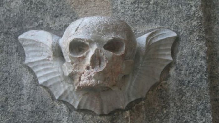 A winged skull marks the entrance to the crypt beneath St. Stephen’s Cathedral