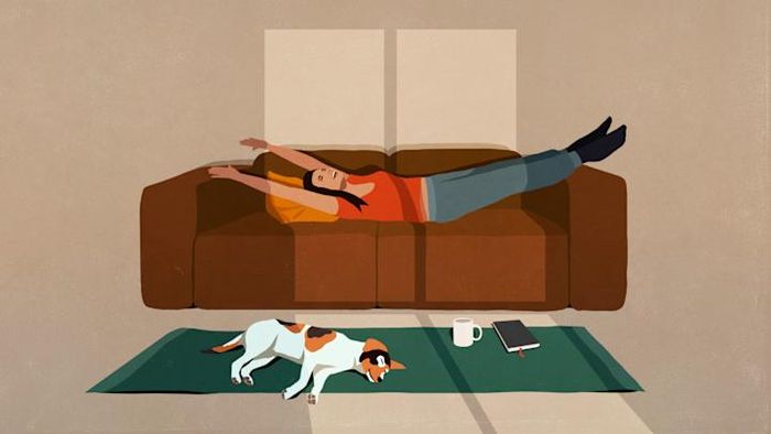 She feels joyful now that she realizes she's reclining—not placing something down.