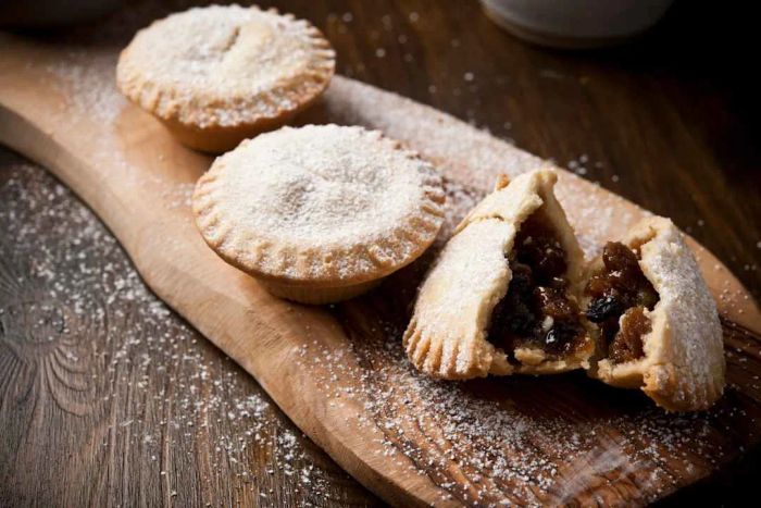 three mince pies, one broken