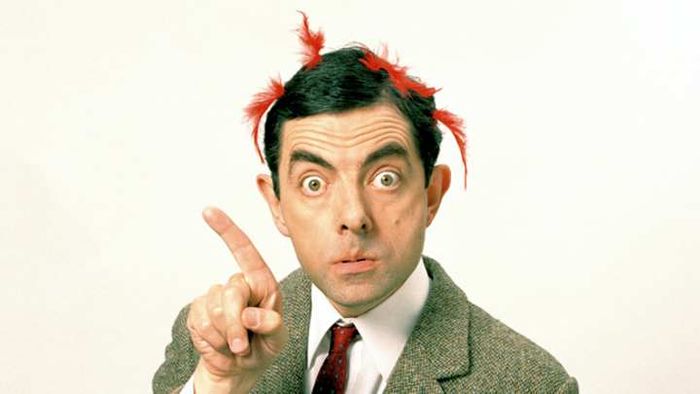 Rowan Atkinson portraying the iconic Mr. Bean.