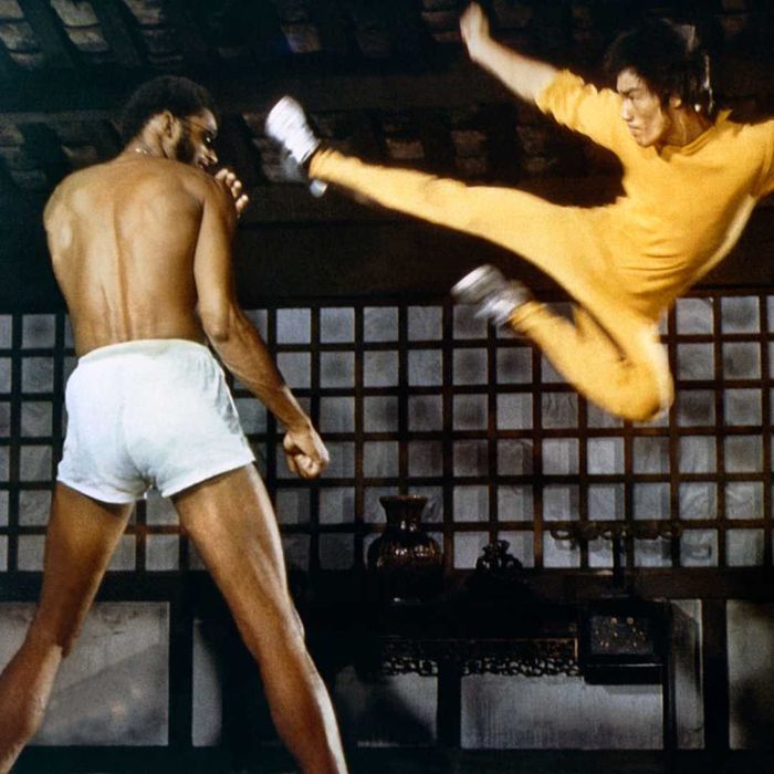 A promotional image from 'Game of Death' featuring Bruce Lee and Kareem Abdul-Jabbar is displayed