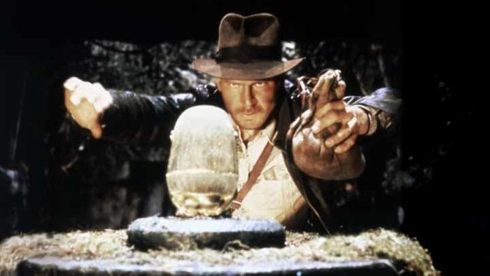 Harrison Ford on the set of 'Raiders of the Lost Ark' (1981).