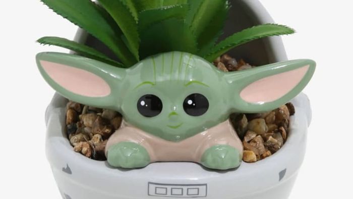 The secrets of an ancient alien species are concealed within the eyes of this wide-eared infant.