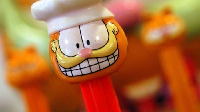 A Pez dispenser featuring the character Garfield.