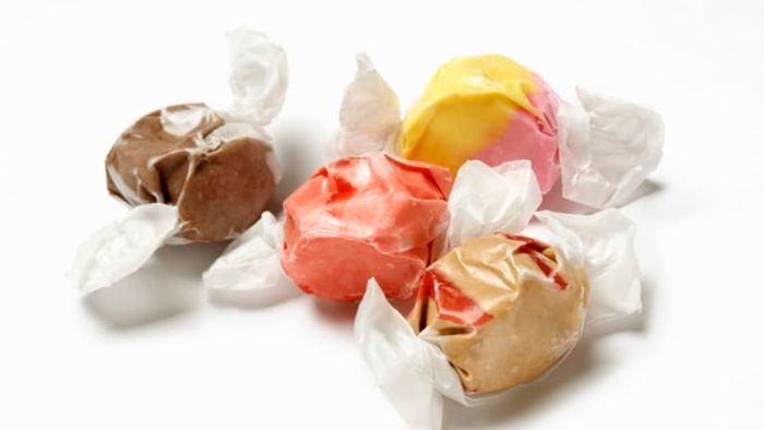 A handful of salt water taffy pieces.