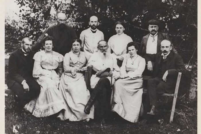 Leo Tolstoy and his wife Sophia are pictured with eight of their children.