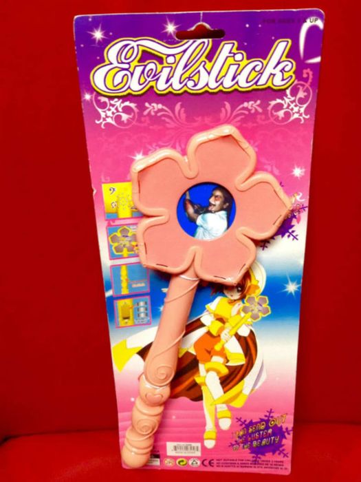 The packaging of the 'Evilstick' toy wand.