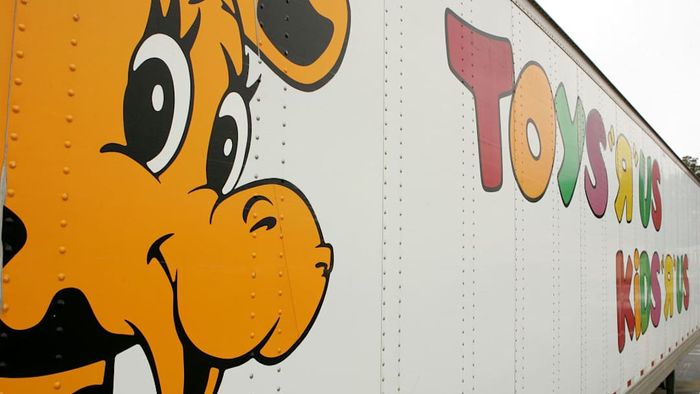 A Toys 'R Us truck is shown