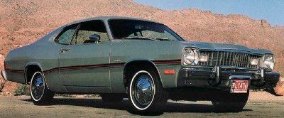 The 1976 Plymouth Silver Duster boasted a canopy vinyl roof and stylish lower-body striping.
