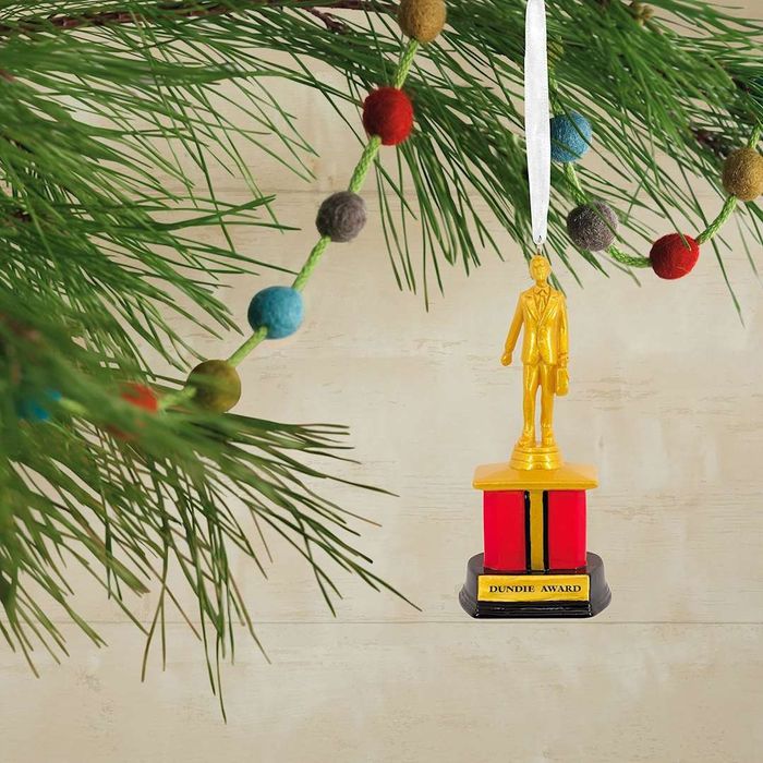 The Office's Dundie Award ornament, proudly displayed on a Christmas tree