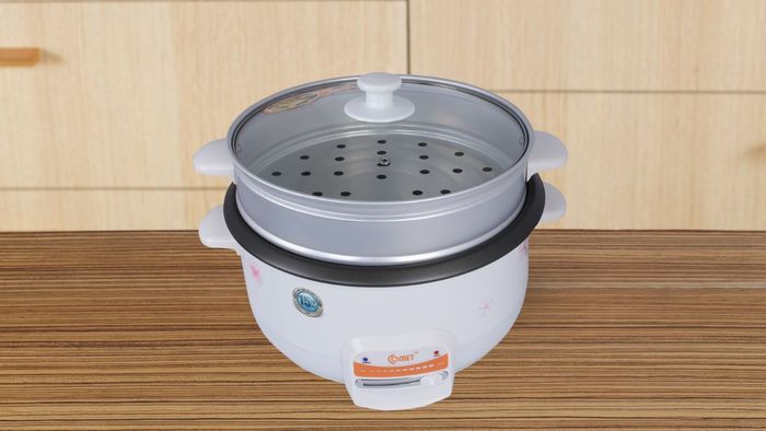 Nồi lẩu điện Comet CM7732 1300W làm bằng thép sơn tĩnh điện