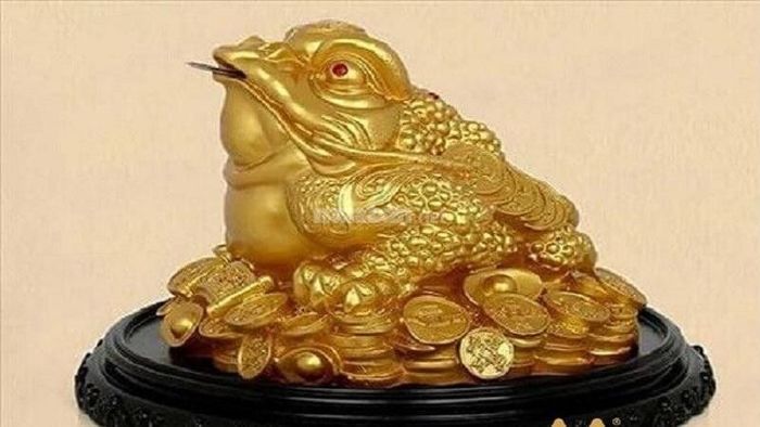 Ý nghĩa phong thủy của cóc ngậm tiền.