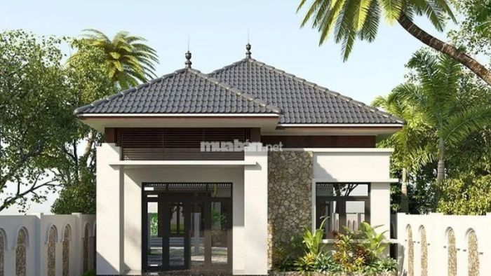 Nhà cấp 4 1 tầng 80m2 mái Nhật sở hữu kiểu dáng đơn giản nhưng thanh thoát, mang lại không gian sống mát mẻ và gần gũi với thiên nhiên.