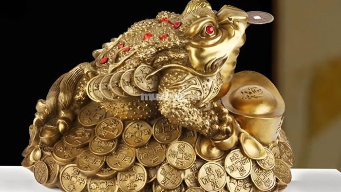 Cóc ngậm tiền - biểu tượng của tài lộc và phú quý, giúp gia chủ thu hút may mắn và sự giàu có