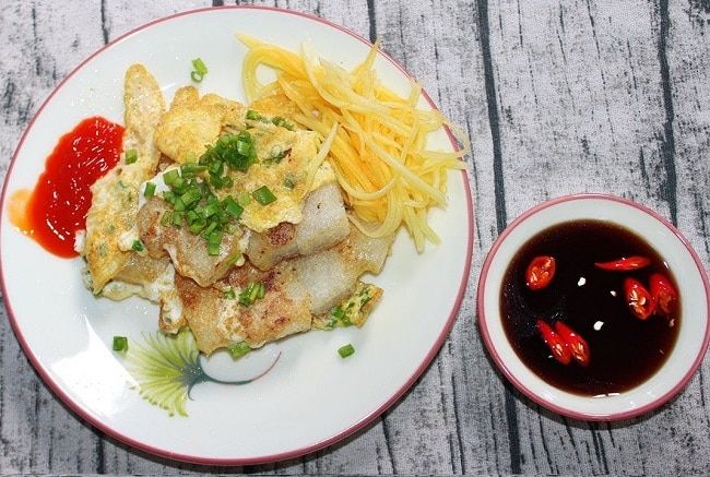 Bột Chiên Trứng & Nui Xào Bò tự hào góp mặt trong danh sách những quán ăn vặt ngon nhất Quận 7, mang đến trải nghiệm ẩm thực đáng nhớ