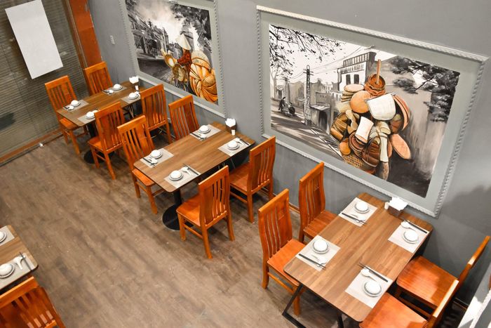 Nồi lẩu bò nhúng dấm thơm ngon bốc khói tại Kói