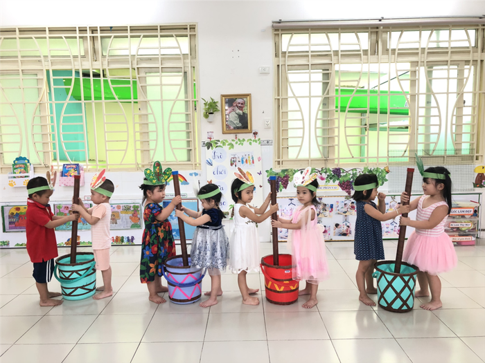 Hình ảnh 1 Trường Mầm non Họa Mi - Góc nhìn toàn cảnh ngôi trường xinh xắn với khuôn viên tràn ngập cây xanh và khu vui chơi sáng tạo.