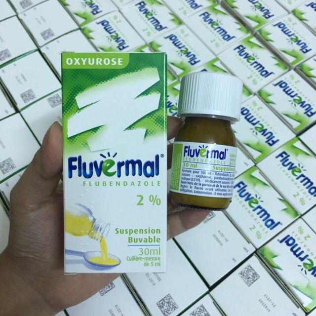 Hình ảnh thực tế siro Fluvermal và thìa đong đi kèm