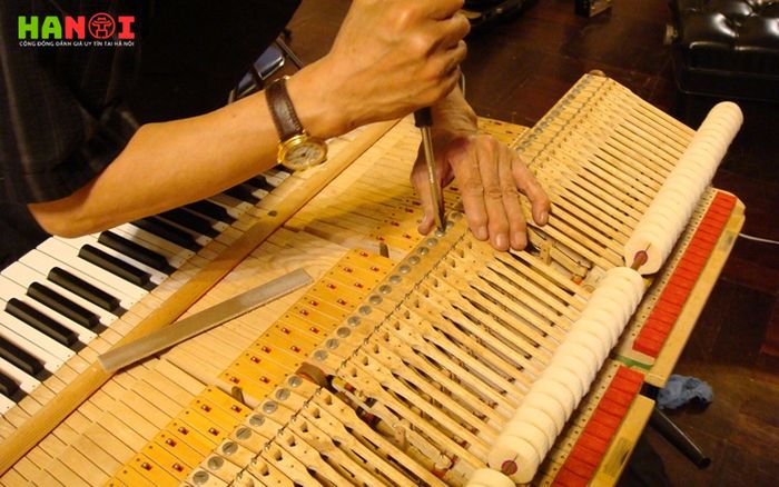 quang-mung-music-dia-chi-sua-dan-piano-tin-cay
