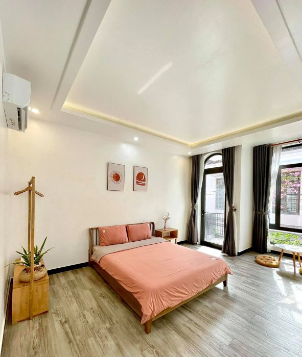 Ảnh 1: Le Petit Homestay - Phòng nghỉ vintage với gam màu pastel dịu dàng, không gian sống ảo lý tưởng và tiện nghi hiện đại đầy đủ.