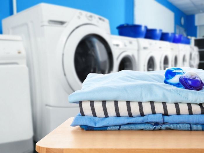 Hình ảnh hệ thống giặt sấy hiện đại và không gian phục vụ chuyên nghiệp tại Mỹ Thoại