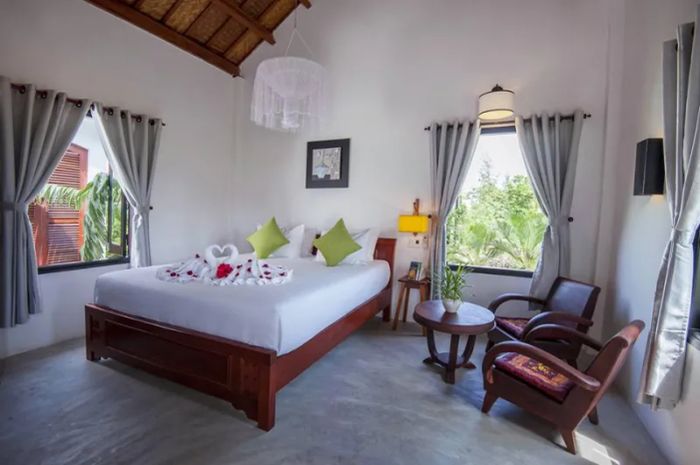 Ảnh 1: Không gian xanh mướt tại An Bang Garden Homestay