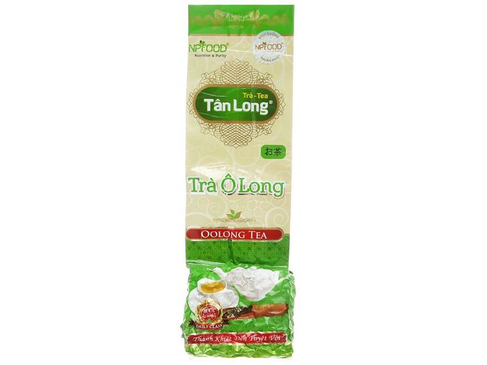 Trà Ô Long Tân Long ảnh 2 - Hình ảnh chân thực về những lá trà xanh mướt, cuộn tròn khéo léo, hứa hẹn một ấm trà thơm ngon trọn vị.
