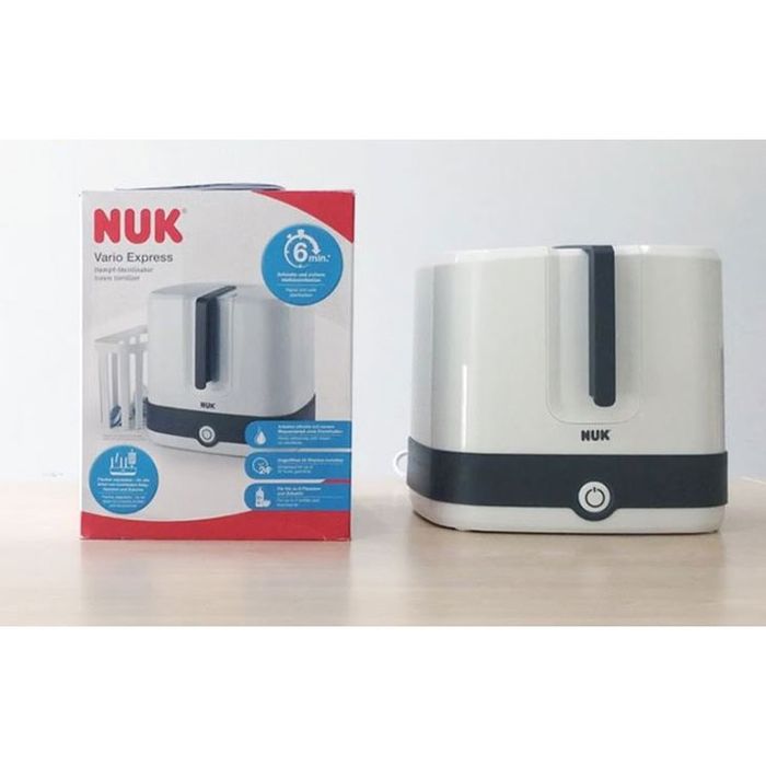 Máy Tiệt Trùng Bình Sữa NUK ảnh 1 - Tiện lợi, dễ sử dụng, giúp mẹ chăm sóc sức khỏe bé yêu mọi lúc mọi nơi.