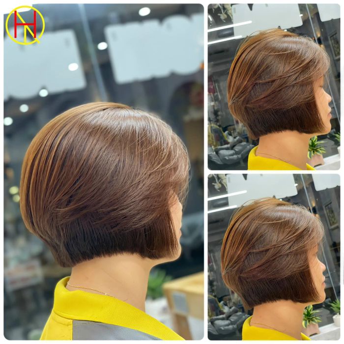Học viên thực hành kỹ thuật cắt tóc chuyên nghiệp dưới sự hướng dẫn của NTM Toni Hòa