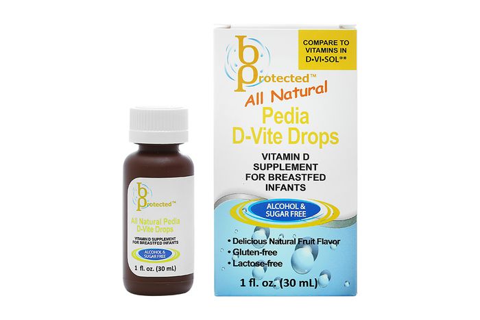Hình ảnh thực tế chai Pedia D-Vite Drops với ống hút định lượng