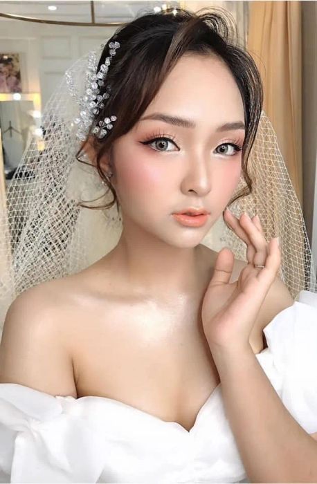 Hình ảnh 1: Cô dâu tỏa sáng với phong cách trang điểm Á Đông tại Minh Nguyễn Studio