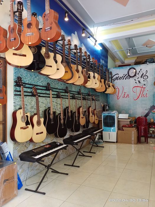 Hình ảnh ấn tượng về Guitar Văn Thi