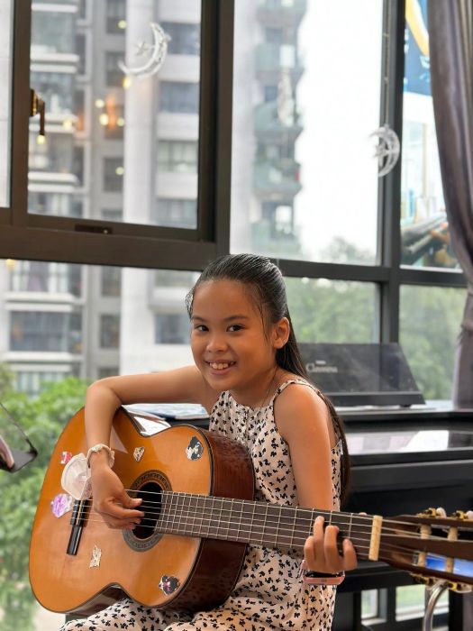 Hình ảnh lớp học guitar đầy cảm hứng tại Sông Thu