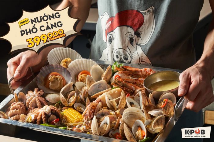 K-Pub - Khung cảnh sôi động với những bàn nướng dài ấn tượng, nơi hương thơm từ thịt nướng thùng phuy hòa quyện cùng vị phô mai béo ngậy tạo nên trải nghiệm ẩm thực khó quên
