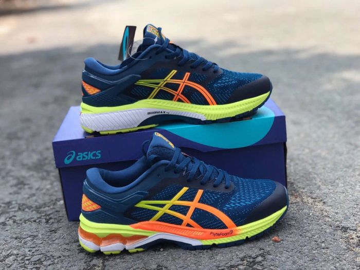 ASICS - Hình ảnh minh họa tinh thần vận động bền bỉ qua thiết kế đầy cảm hứng, màu sắc biểu tượng.