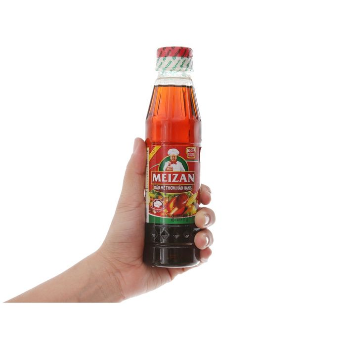 Hình ảnh chai dầu mè Meizan cao cấp