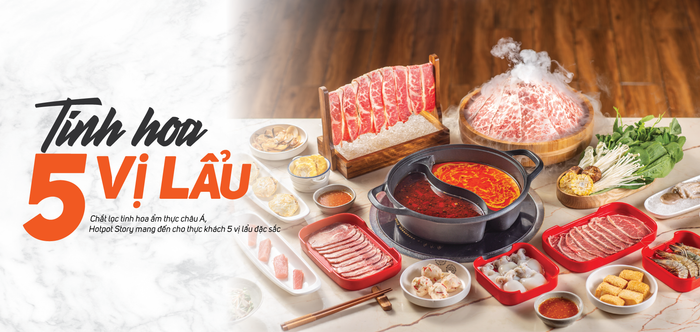 Hình ảnh đặc trưng: Nồi lẩu đôi với hai tầng hương vị quốc tế, bên cạnh quầy buffet rau củ tươi xanh được bày trí nghệ thuật