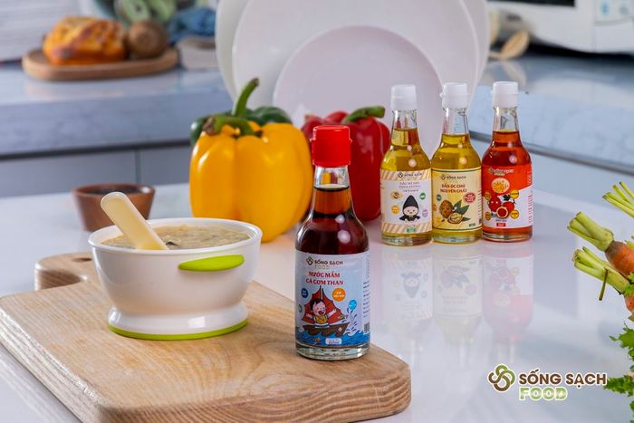 Nước Mắm Cá Cơm Than Cho Bé - Sống Sạch Food (Ảnh minh họa) - Hình ảnh chân thực về sản phẩm chất lượng, gợi mở niềm tin từ màu sắc tự nhiên và thiết kế tinh tế.