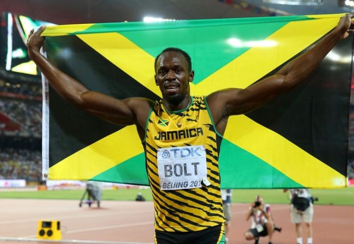 Khoảnh khắc lịch sử - Usain Bolt 'bay' qua vạch đích với nụ cười bất hủ