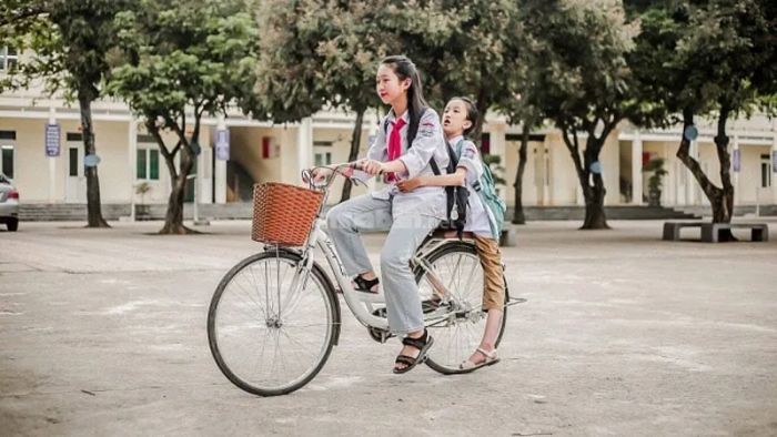 Ngồi sau xe đạp trong mơ báo hiệu điều gì?