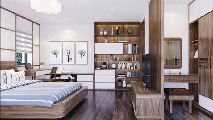 Một mẫu phòng ngủ phong thủy với không gian thoáng đãng, ấm cúng nhờ màu gỗ chủ đạo, tạo cảm giác gần gũi và dễ chịu.